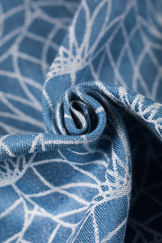 Lenny Lamb 100% linen fabric in Lotus - Blue, a light blue background with white outlined lotus flowers