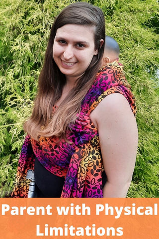 Mama & Roo's owner Alexandra carrying a demo doll on her back in Exclusive print Sunset Wreath. Text reads, "Parent with Physical Limitations"