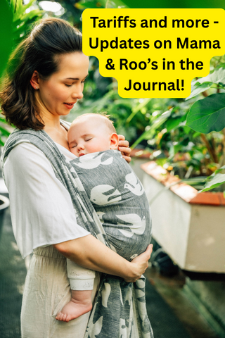Mother wearing her child in a limited edition Birdy - White Noise long woven wrap, available at Mama & Roo's. Text reads, "Tariffs and more - Updates on Mama & Roo's in the Journal!"
