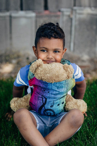 Doll carrier in design Symphony Rainbow Dark