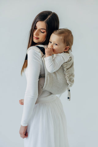 Onbuhimo waist-less wrap conversion baby backpack carrier in limited edition design Airy, in luxury cotton/hemp/lyocell blend. Side view white background thumb in baby's mouth