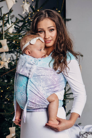 Glittering Snow Queen sample photo in Wrap Tai wrap strap meh dai carrier. Available now for a limited time at Mama & Roo's!