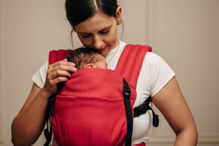 LennyLight wrap conversion soft structured baby backpack carrier (SSC) for children from newborn to 3yrs+ in woven cotton design Sedona, a red and orange herringbone weave