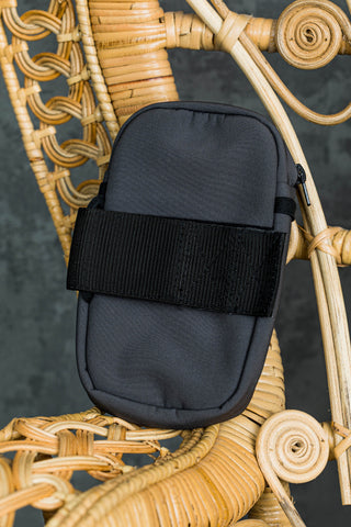 Portable baby carrier pocket for carrier strap